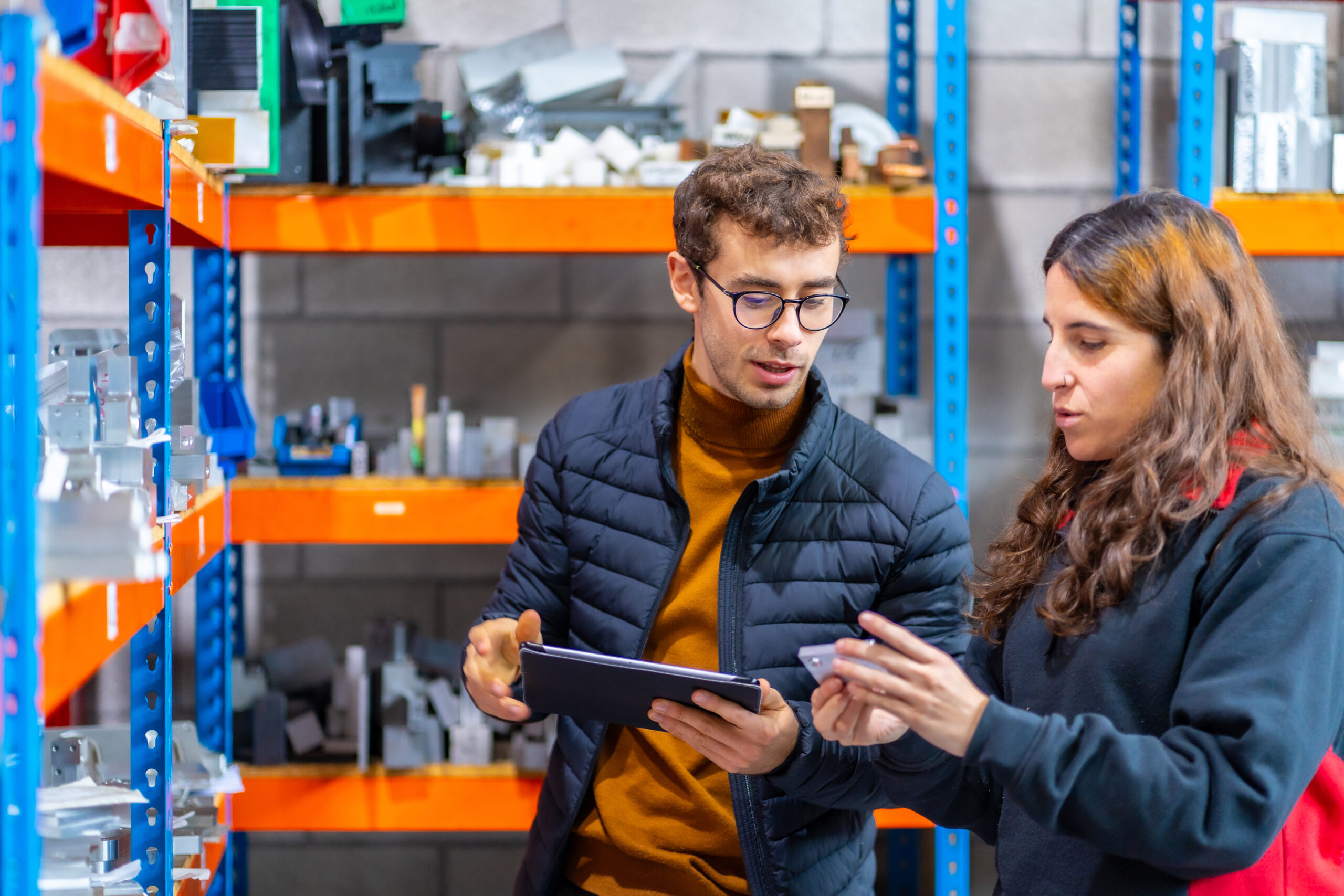 two employees in a warehouse